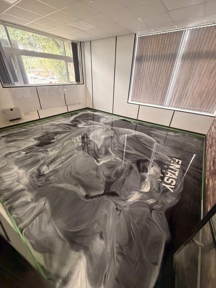 Black metallic commercial resin floor in an office