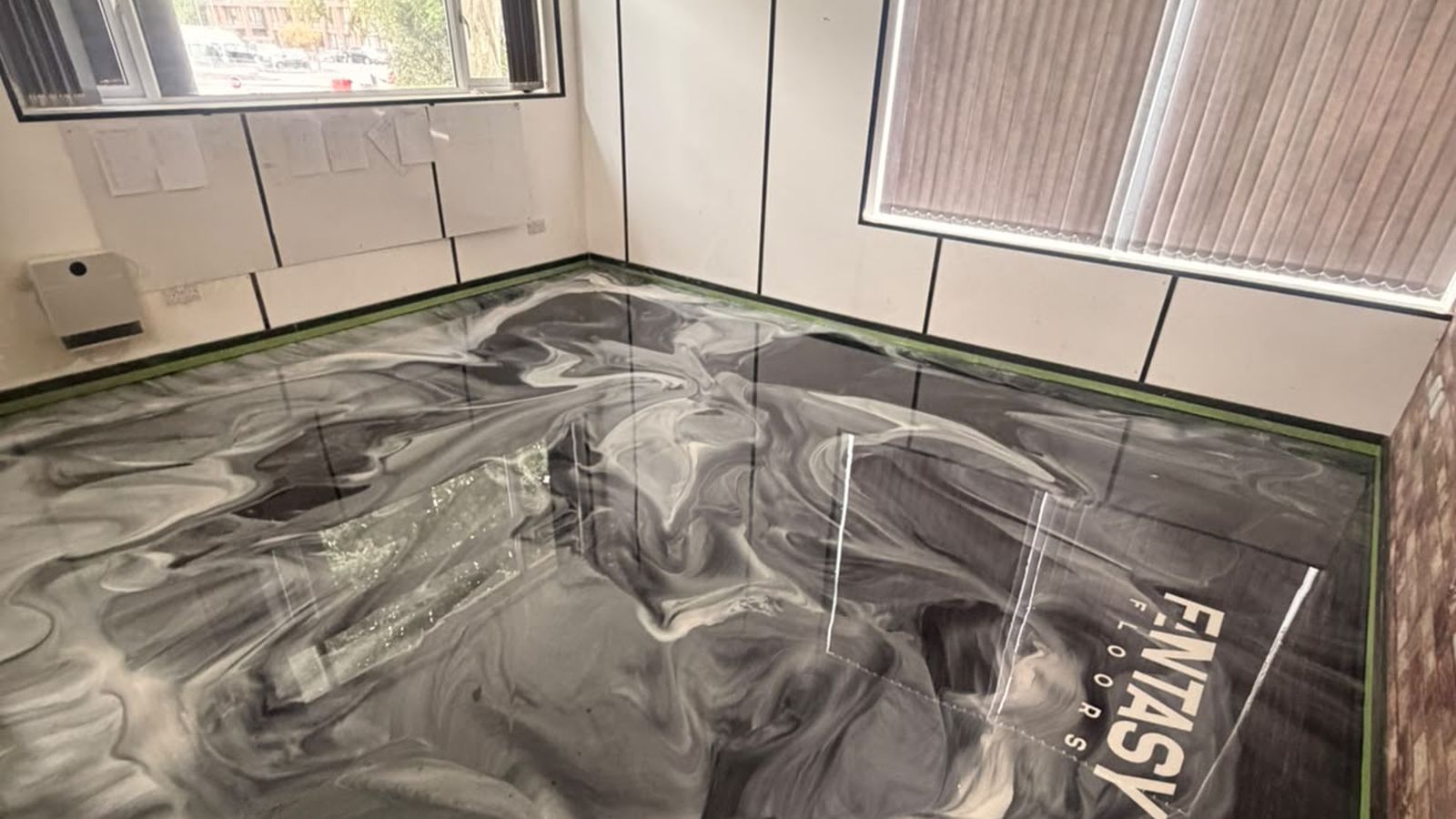 Black metallic office resin floor, wide view