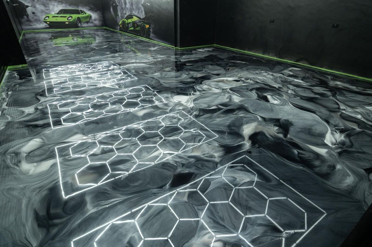Faux marble resin showroom floor with hexagon lighting