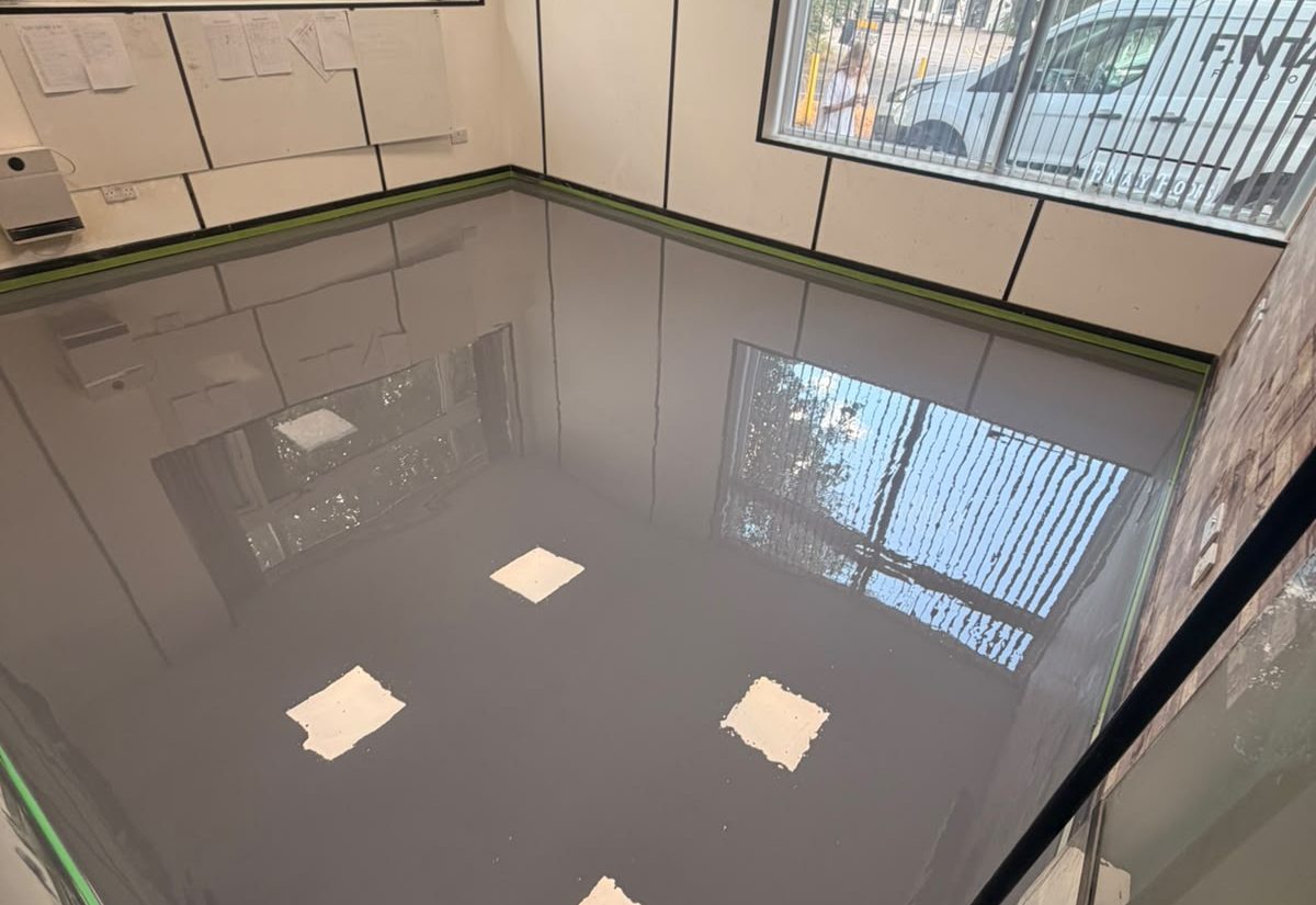 Office floor before resin coating, primed base