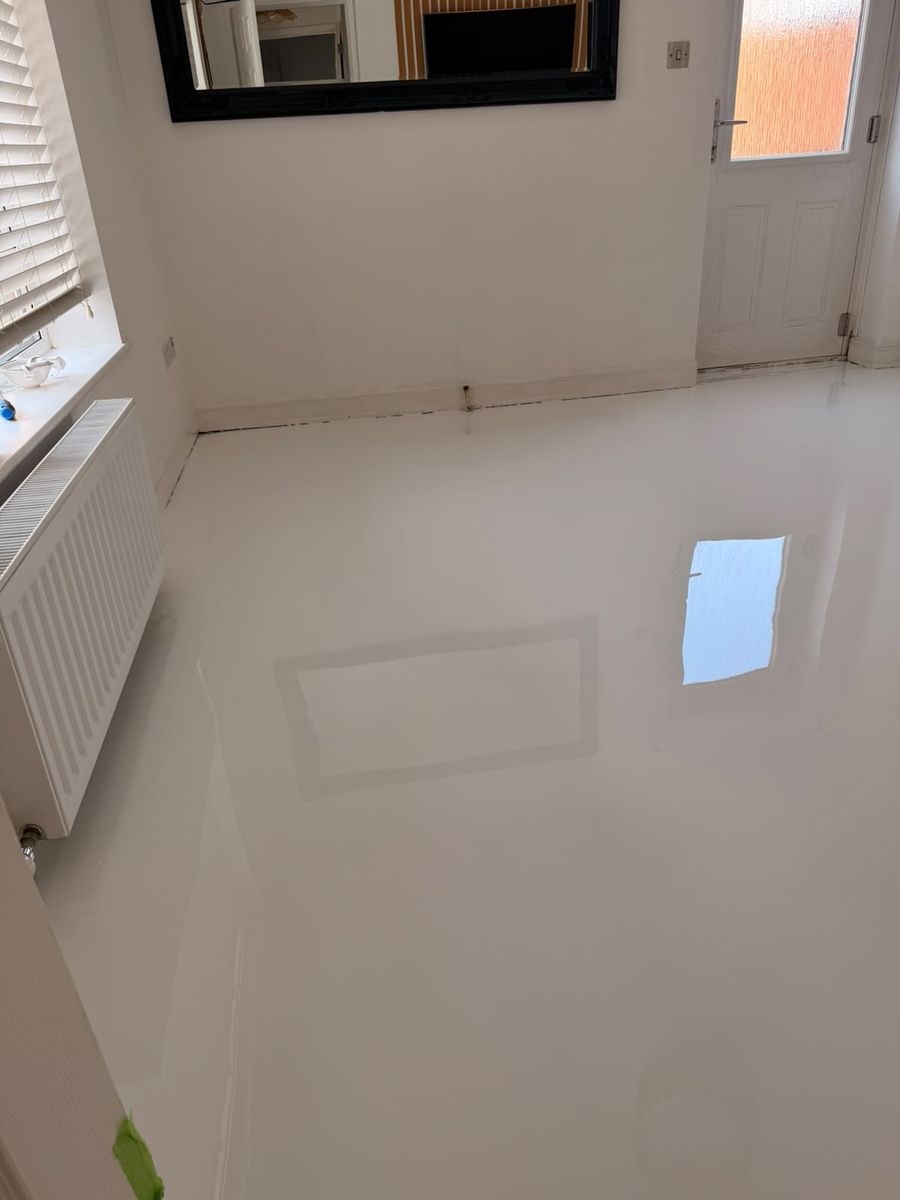 White marble-effect resin floor in a modern living room